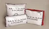 Three packaged bedding items are displayed on a light gray background. Produktbild-Vorschau