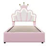 A pink upholstered bed frame with a crown-shaped headboard and LED lighting. Produktbild-Vorschau