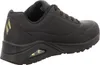 A side view of a black Skechers Uno women's sports shoe with gold accents. Voir les images du produit