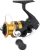 A studio shot of a fishing reel against a white background. Produktbild-Vorschau