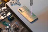 A gold Vivo V23 5G smartphone with a circuit board design is being laser-etched. Náhled obrázku produktu