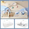 A white wooden children's bed with a house-shaped frame, shown in a nursery setting and in two separate views. Podgląd zdjęcia produktu