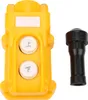 A yellow push-button switch for a hoist and a black rubber cap are shown against a white background. Náhľad obrázku produktu