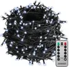 A coiled string of white LED lights with a black wire, shown with a remote control. Náhľad obrázku produktu