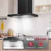 A kitchen scene featuring a black range hood with its lights on, and a close-up inset showing the LED lights and feature icons. Produktbild-Vorschau