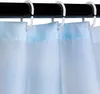 Close-up of a light blue shower curtain hanging from a black rod with white hooks. Produktbild-Vorschau