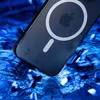 A close-up shot of an iPhone case with MagSafe technology, appearing to be dropped onto a shattered blue surface. Náhled obrázku produktu
