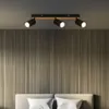 A bedroom scene with a ceiling light fixture above a bed. Produktbild-Vorschau