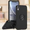 A black iPhone XR case with a ring holder is displayed on a wooden surface, with another iPhone XR case in the background. Voir les images du produit
