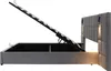 A side view of a gray upholstered bed frame with the storage compartment open, revealing the lifting mechanism and interior space. The headboard has integrated lighting. Podgląd zdjęcia produktu
