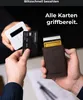 Hands holding a credit card and a cardholder with multiple cards, with a payment terminal in the background. Produktbild-Vorschau