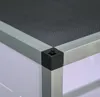 A close-up view of the corner of a terrarium frame, showing the aluminum construction and a black plastic corner connector. Produktbild-Vorschau