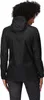 A woman wearing a black jacket and patterned leggings, viewed from the back. Produktbild-Vorschau
