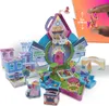 A toy playset with multiple miniature buildings and figures, including a central castle-like structure. Produktbild-Vorschau