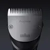 A close-up view of a beard trimmer head, showing the blades and branding. Náhľad obrázku produktu