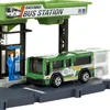 A toy bus station with a toy bus and toy figures. Náhľad obrázku produktu