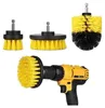 A collection of drill brush attachments and a drill. Voir les images du produit