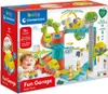 The image shows the packaging of a baby toy garage with cars and a baby playing. Podgląd zdjęcia produktu