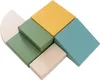 A collection of colorful foam building blocks arranged in a playful, abstract pattern on a white background. Anteprima dell’immagine prodotto