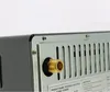 Close-up of the back of a portable gas oven, showing the gas inlet connection. Voir les images du produit