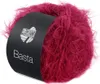 A ball of fuzzy red yarn with a black label. Produktbild-Vorschau