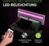 A bed with a modern LED-lit headboard, a remote control, and descriptive icons. Náhľad obrázku produktu