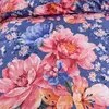 A close-up view of a floral pattern on fabric. Náhled obrázku produktu