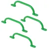 Four green climbing grips arranged in a staggered pattern on a white background. Voir les images du produit