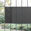 A privacy screen for a fence, showing its texture and how it attaches to the fence posts. Anteprima dell’immagine prodotto