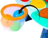 A close-up of a toy with a basket and balls, with an arrow indicating movement. Podgląd zdjęcia produktu