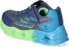 A side view of a child's sneaker with lights. Voir les images du produit