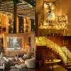 A collage of four images showing string lights used for decoration in various settings, including an outdoor patio, a decorative shelf, a living room with a projector, and a staircase. Náhľad obrázku produktu