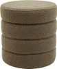 A stack of four round, textured ottomans or storage stools.