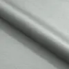 A close-up, diagonal view of a folded piece of light gray fabric. Podgląd zdjęcia produktu