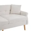 A close-up view of a beige sofa with a pillow. Anteprima dell’immagine prodotto