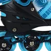 A close-up view of the wheels and frame of a blue and black inline skate. Náhľad obrázku produktu