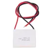A thermoelectric generator module with attached red and black wires, shown against a white background. Podgląd zdjęcia produktu