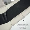 A close-up view of a baby carrier strap, showing adjustment details. Produktbild-Vorschau