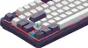 A close-up view of a mechanical keyboard with purple and white keycaps, showing the switches and RGB lighting. Produktbild-Vorschau