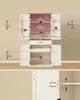A diagram showing the dimensions and measurements of a white cabinet with wooden accents. Náhled obrázku produktu