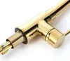 A close-up of a gold-colored faucet connection with visible threads and a black rubber seal. Produktbild-Vorschau