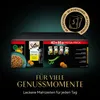 A mega-pack of Sheba cat food portions is displayed against a dark, gradient background. The packaging is prominent, with individual pouches and promotional text visible. Produktbild-Vorschau