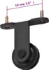 A close-up shot of a black sliding door hardware roller with a measurement indicator. Produktbild-Vorschau
