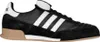 A side view of a black Adidas sneaker with white stripes. Náhled obrázku produktu