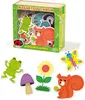 A set of wooden garden magnets displayed on a white background, with the product packaging visible in the upper portion of the image. Náhľad obrázku produktu
