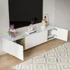 A modern white TV cabinet with gold accents is shown in a living room setting, with one door open to reveal storage space. Anteprima dell’immagine prodotto