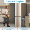 A man carrying a step stool in a kitchen setting, with a refrigerator and cabinets visible. The right side shows the folded step stool next to a dresser. Voir les images du produit