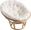 A papasan chair with a white cushion on a white background. Produktbild-Vorschau