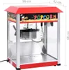 A red and silver popcorn machine with dimensions shown, against a white background. Voir les images du produit