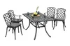 A dining set with a table and four chairs, set against a white background. Náhled obrázku produktu
